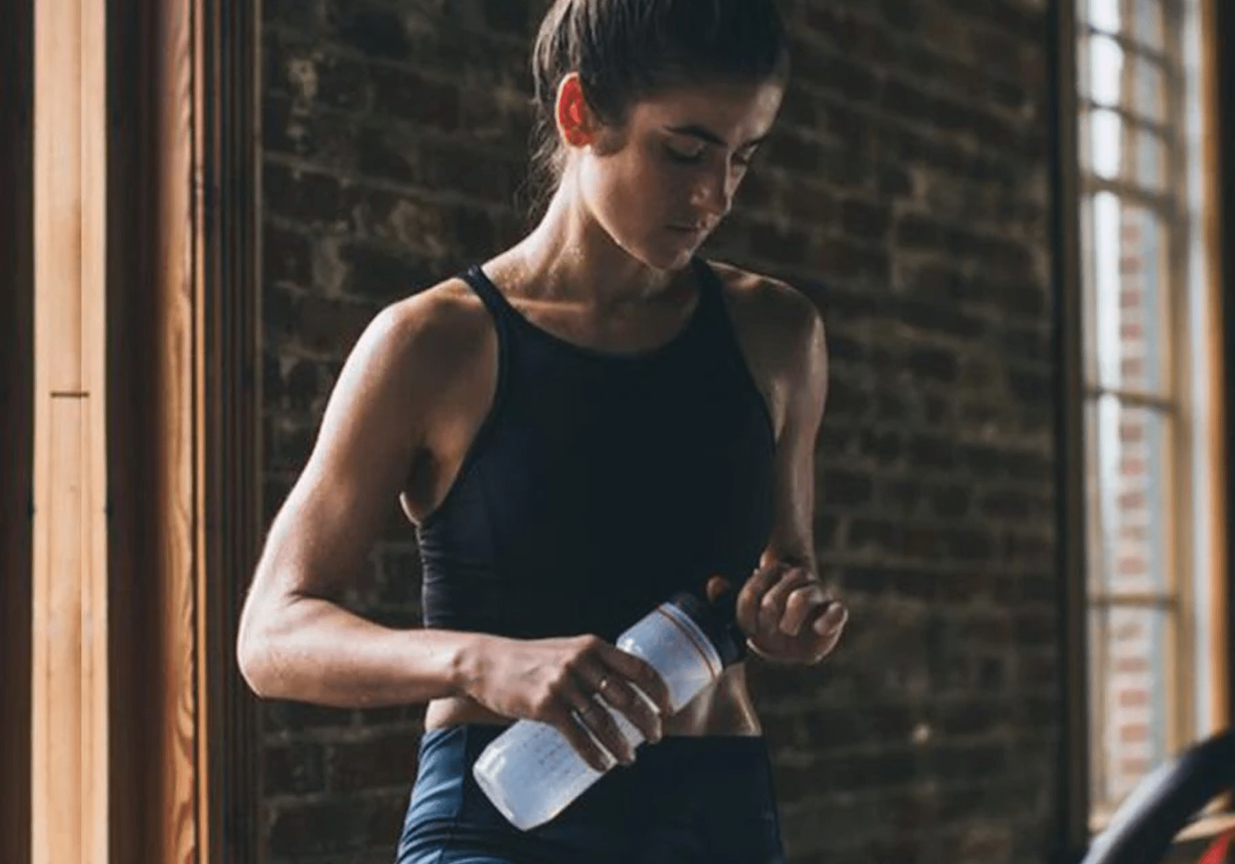 woman sweating during a workout