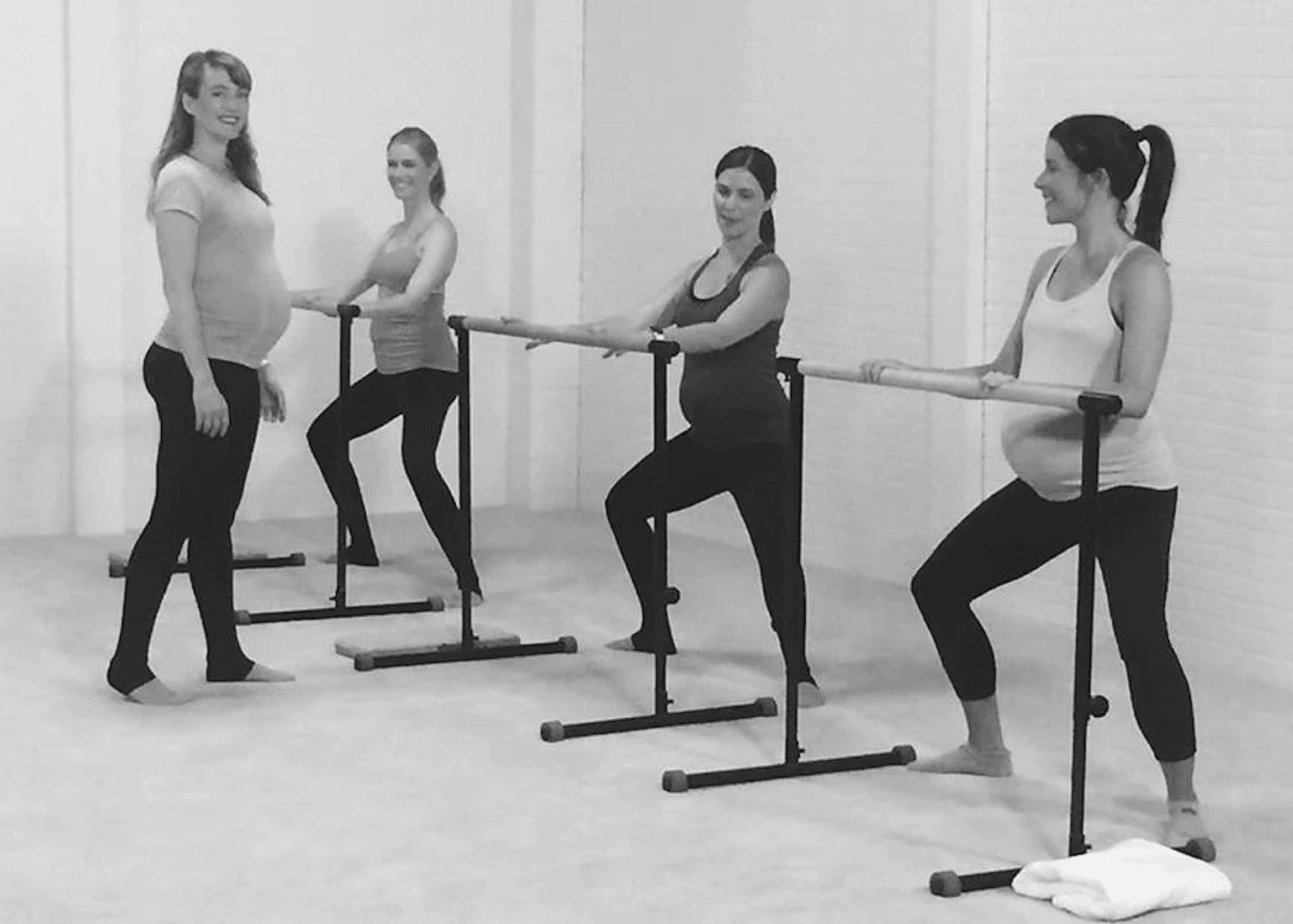 women practicing barre while pregnant
