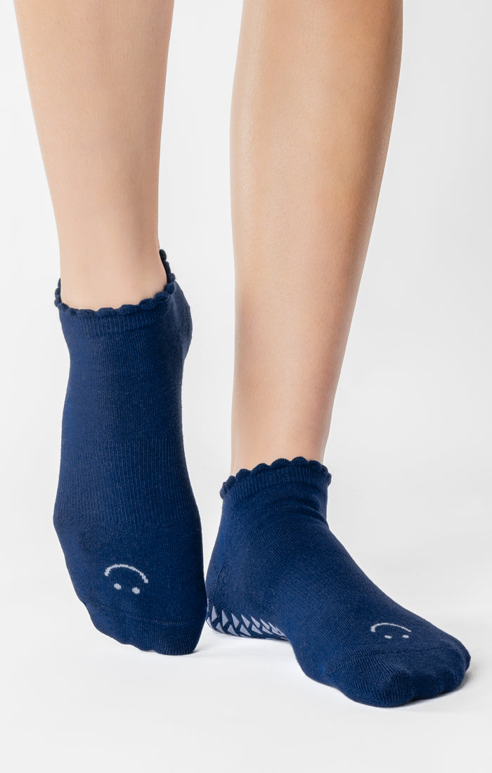 A festive americana Pilates Grip Sock Gift Pack  that includes a red, white, and blue pair of full foot grip socks. Made for pilates, barre, yoga, and beyond. 