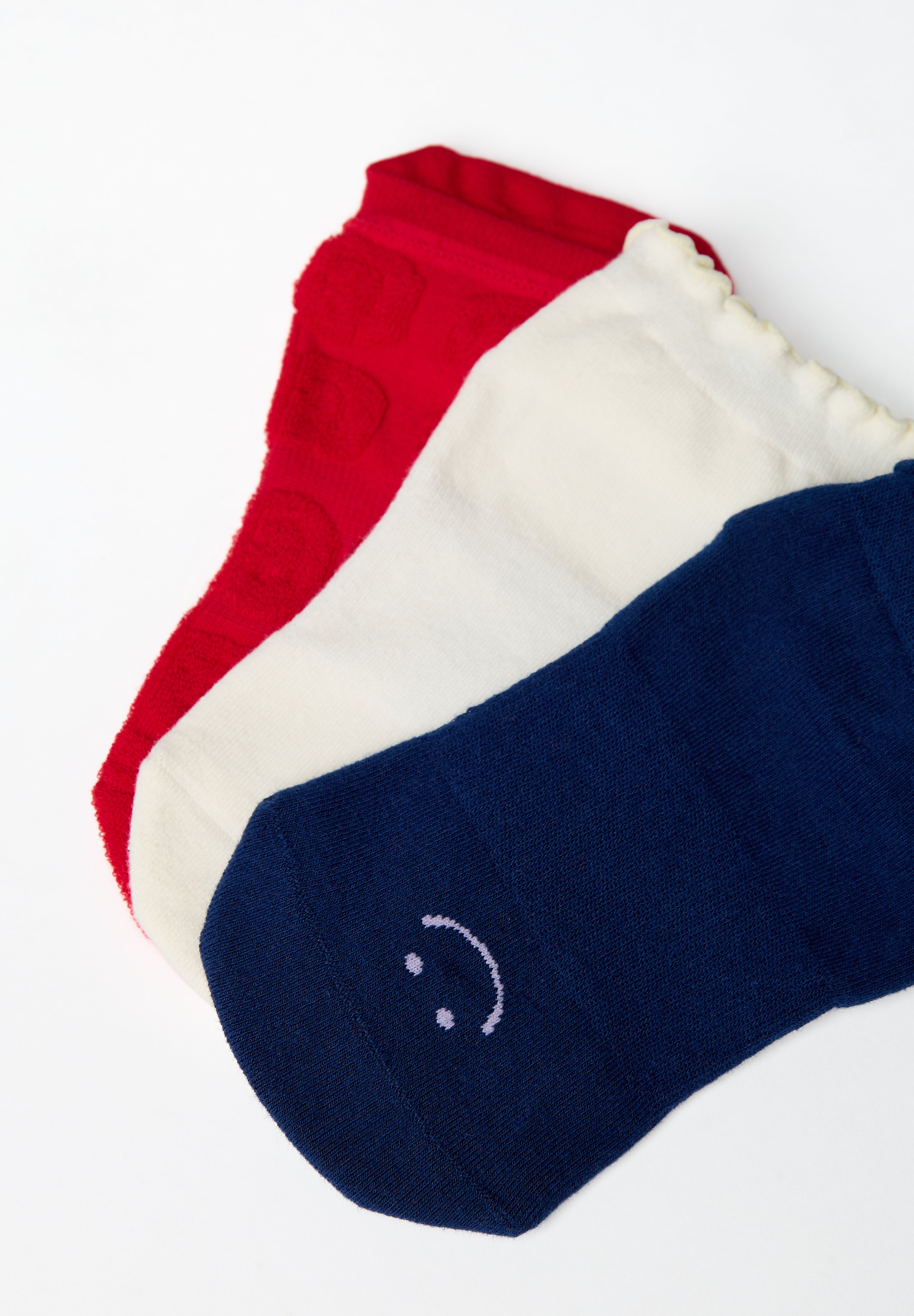 A festive americana Pilates Grip Sock Gift Pack  that includes a red, white, and blue pair of full foot grip socks. Made for pilates, barre, yoga, and beyond. 