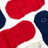 A festive americana Pilates Grip Sock Gift Pack  that includes a red, white, and blue pair of full foot grip socks. Made for pilates, barre, yoga, and beyond. 