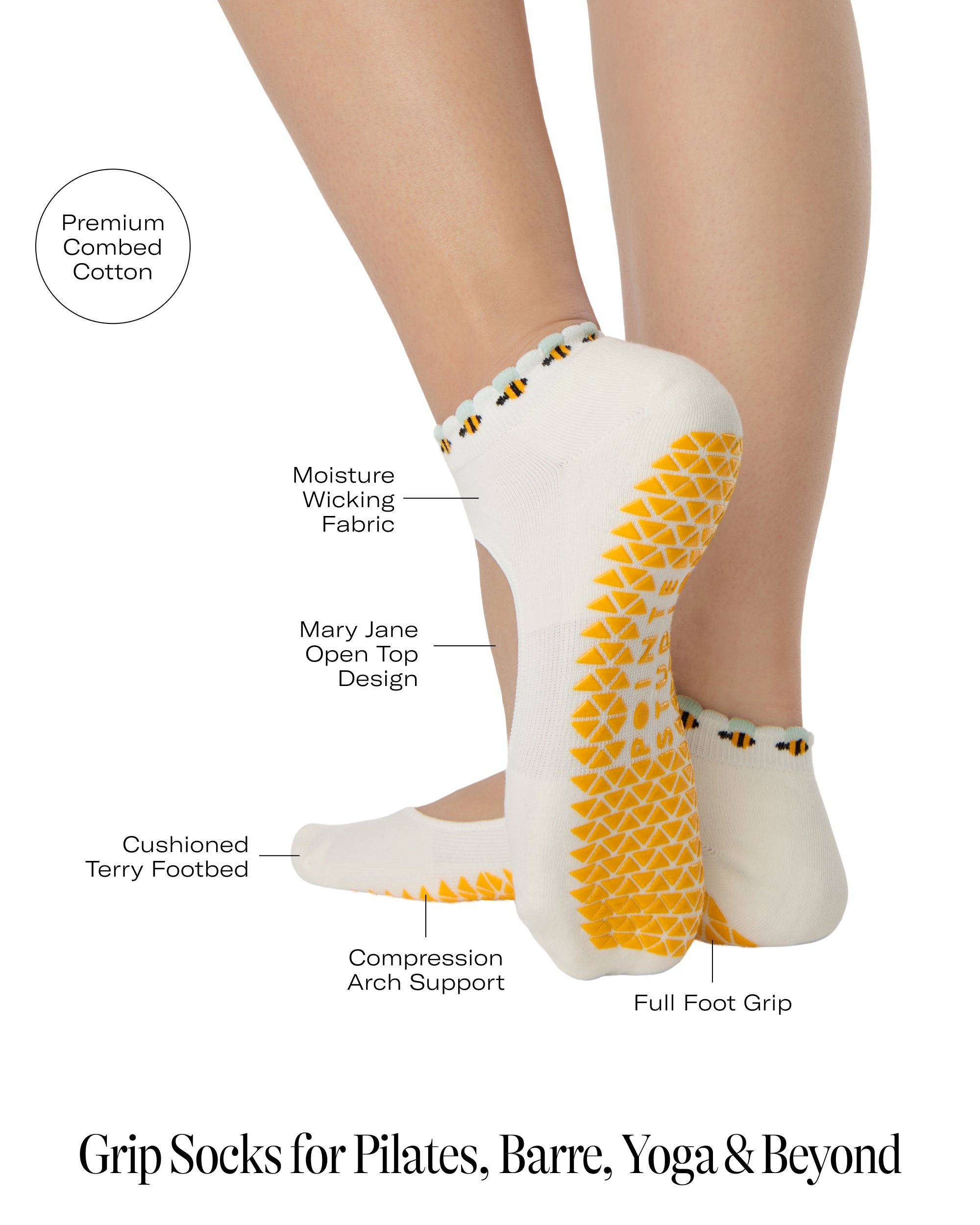 Woman wearing solid white strap grip sock with bumble bees wrapping around the scalloped cuff, made for pilates, barre, yoga, and beyond. With all the product features listed.