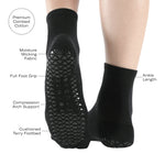 Women wearing a solid black ankle grip sock made for Pilates, Barre, Yoga, and beyond with features listed.