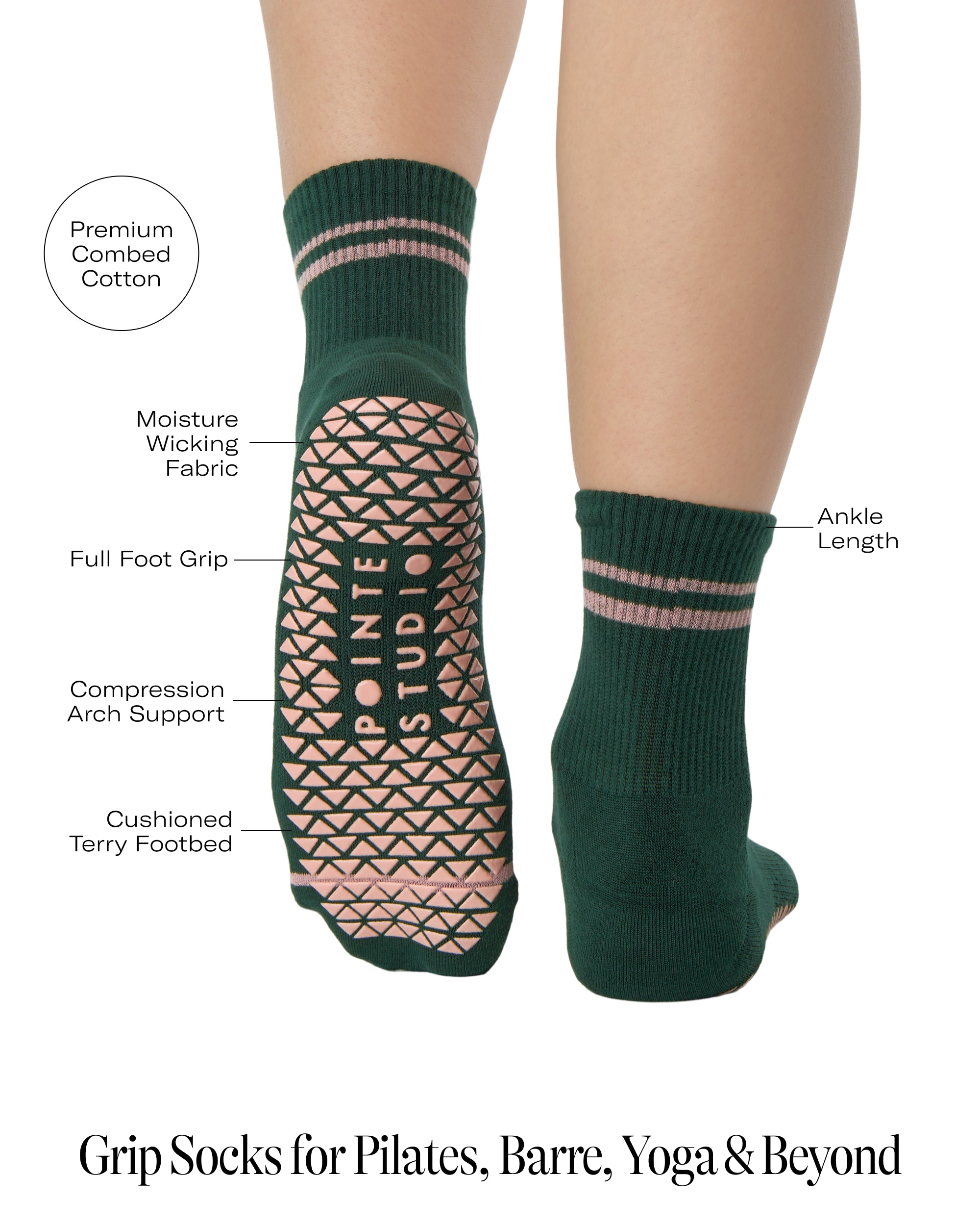 Woman wearing a solid green ankle grip sock with pink stripes on the toes and top ankle cuff made for Pilates, Barre, Yoga, and beyond. With product features listed.